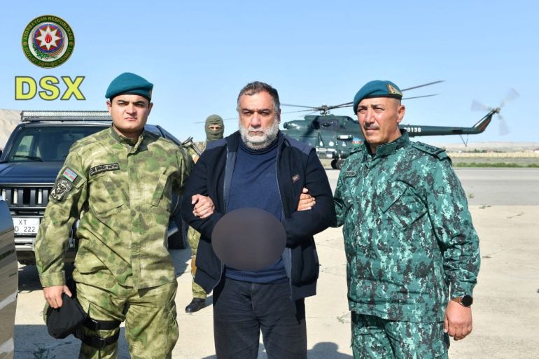 Nagorno-Karabakh’s former top minister arrested amid exodus of thousands from region