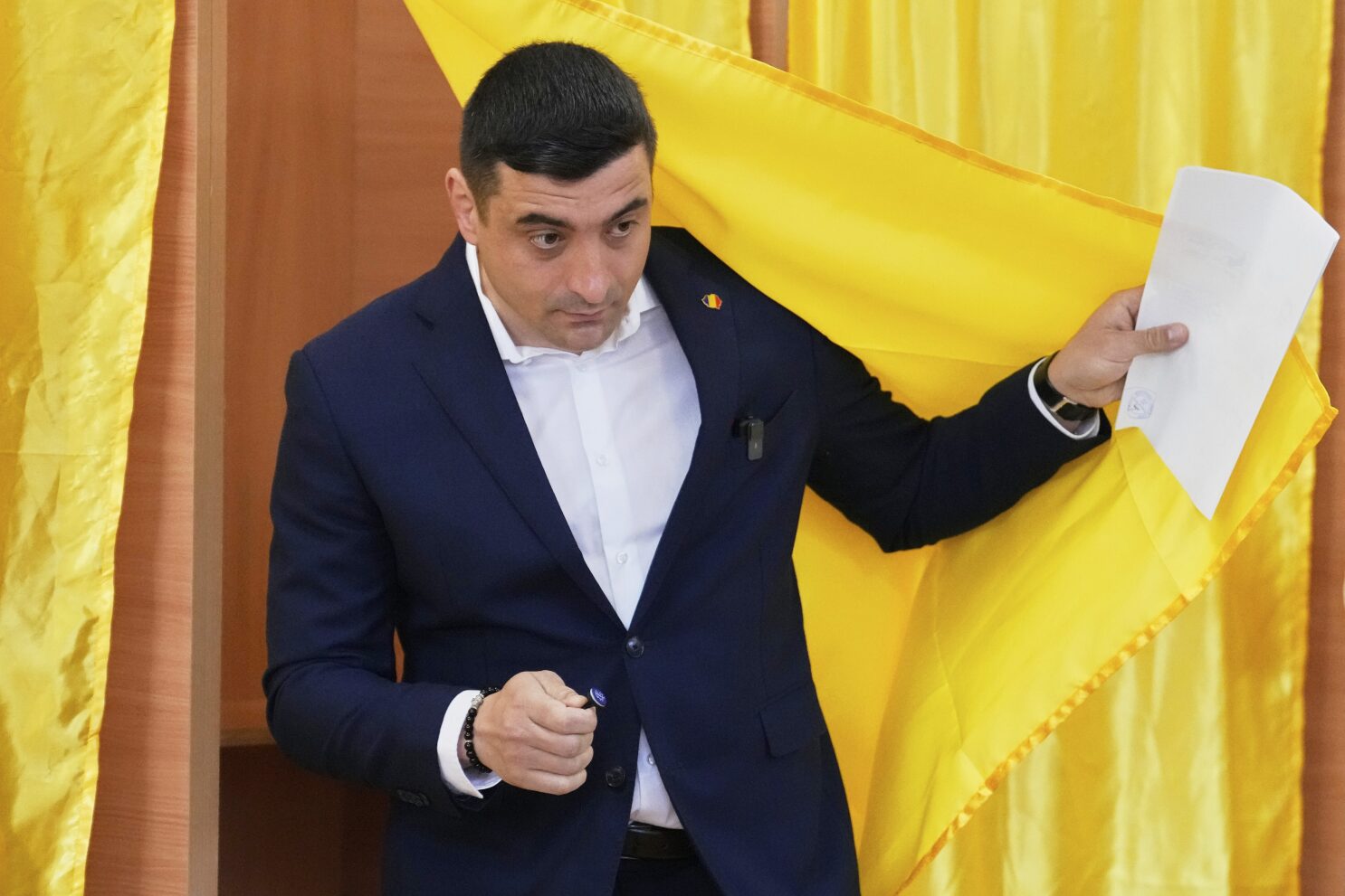 Romania’s defeated far-right candidate seeks annulment of presidential election