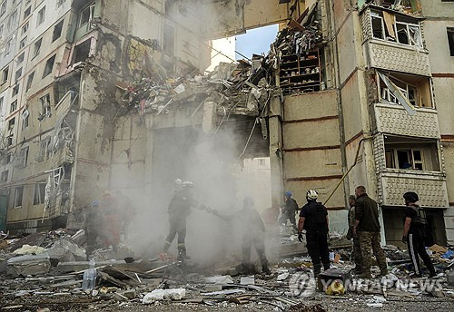 Russian air strikes injure 11 people in Ukraine's capital