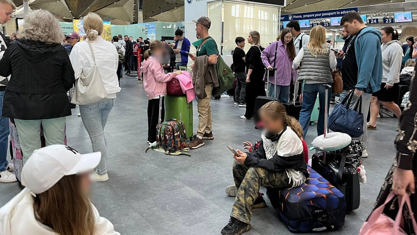 Massive Ukrainian drone attacks disrupt work of airports, trains across Russia